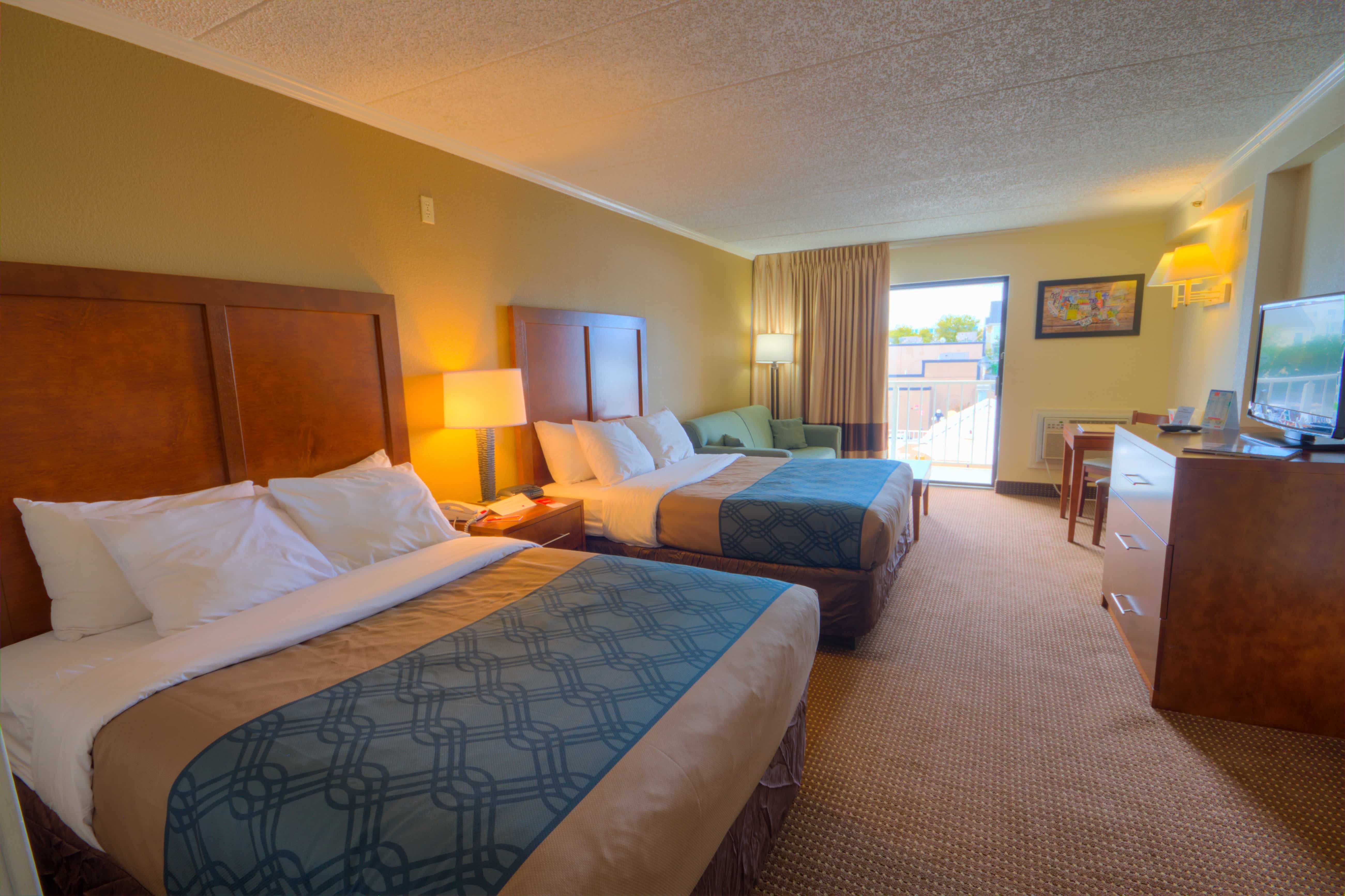 Two double beds in a clean hotel room in ocean city Maryland 